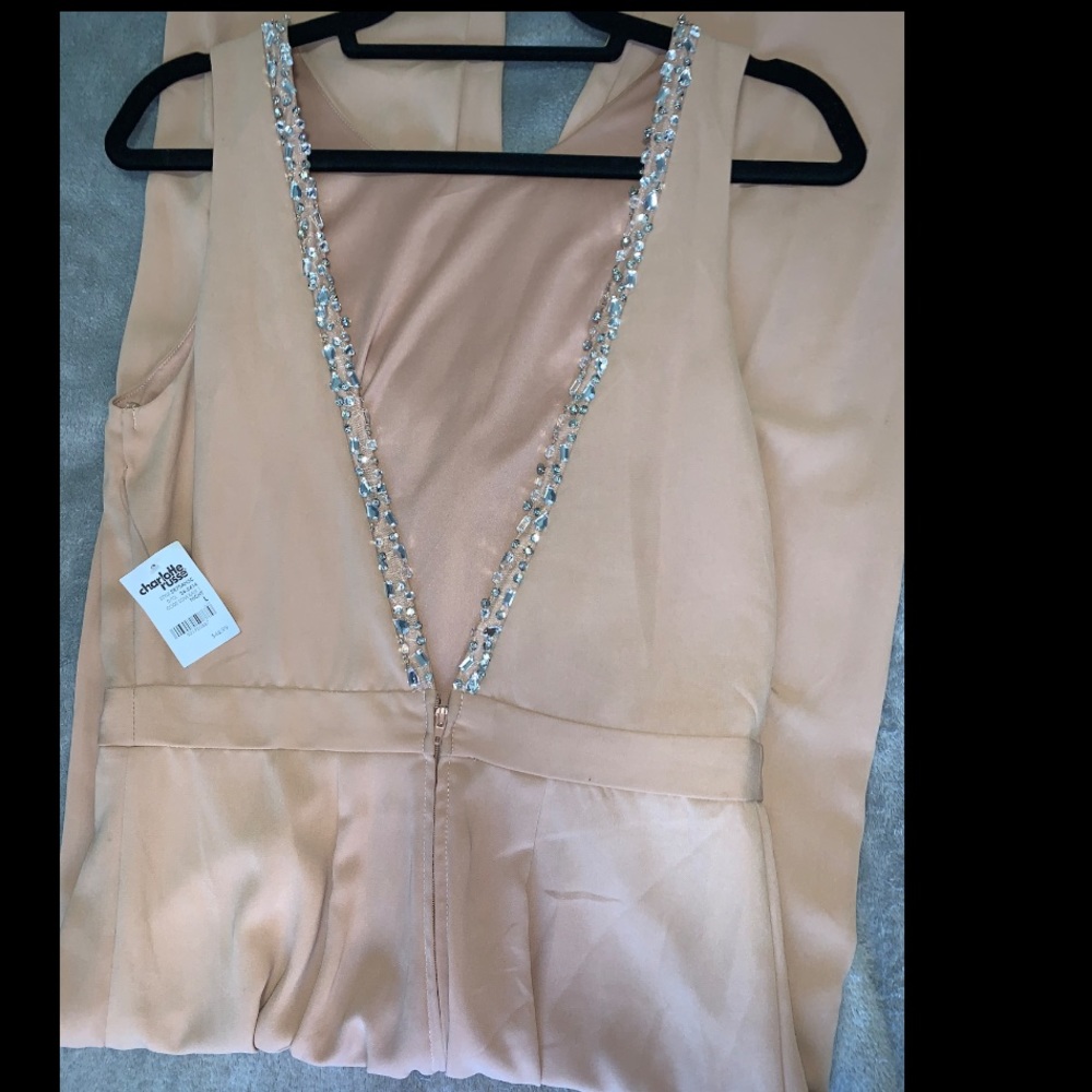 Nude jumpsuit with open back